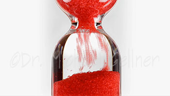 Hourglass with red balls